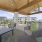 a patio with a table and chairs