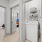 a room with white cabinets and a white machine