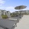 a patio with tables and chairs
