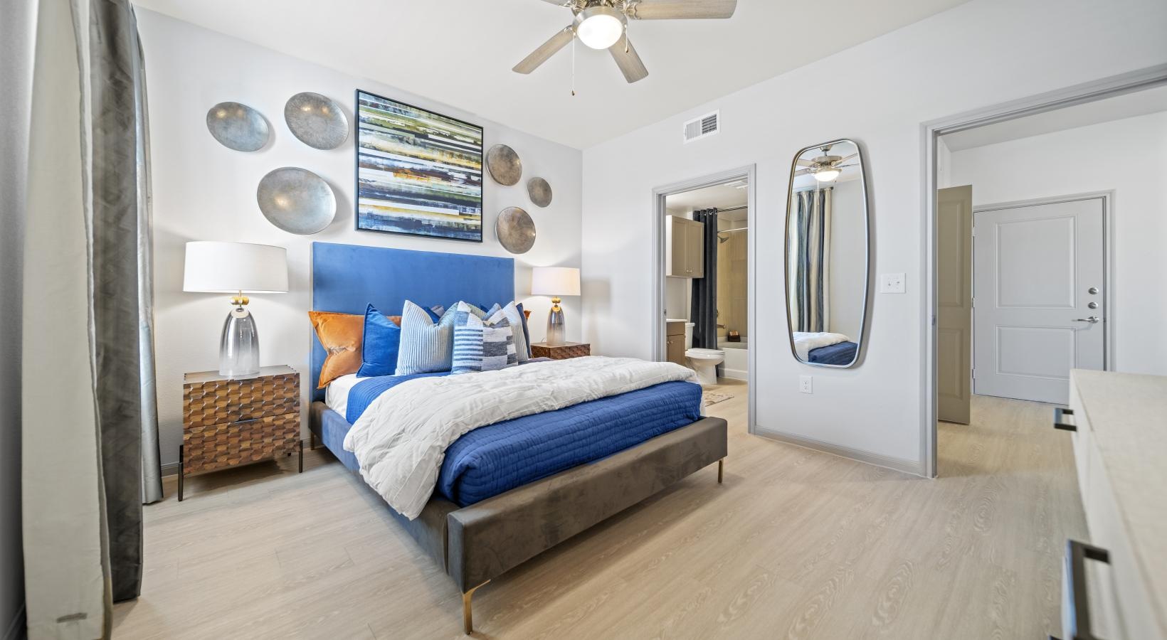 Sleep in style a bedroom with a bed and a mirror