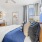 a bedroom with two beds