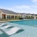 a swimming pool in front of a building