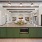 a kitchen with green cabinets