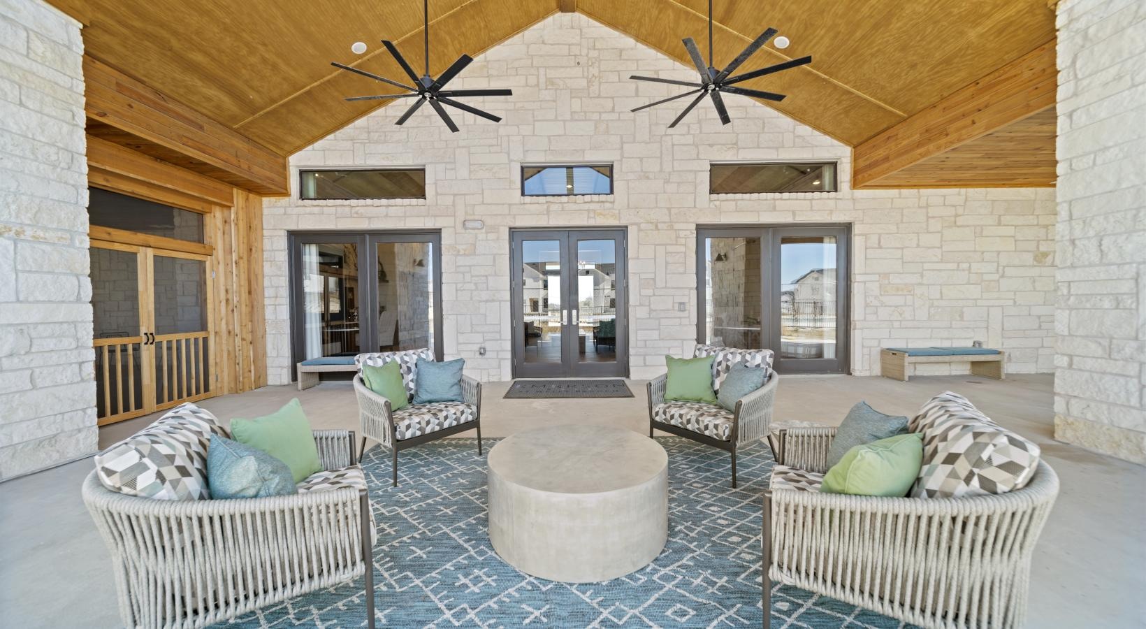 Enjoy our resident-only features a living room with a large ceiling fan